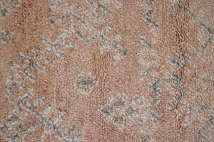 Bloom vintage Beni Ourain rug with a thick textured pile, peach coloured, grey tassels.