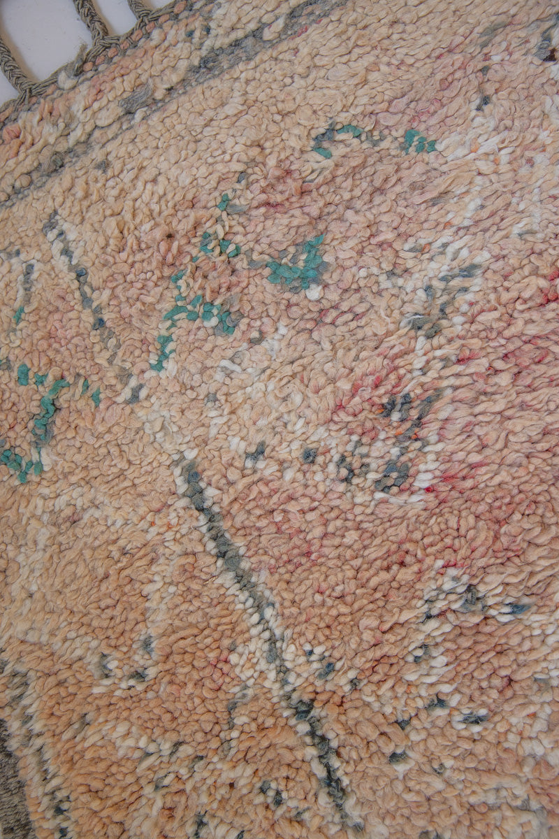 Bloom vintage Beni Ourain rug with a thick textured pile, peach coloured, grey tassels.