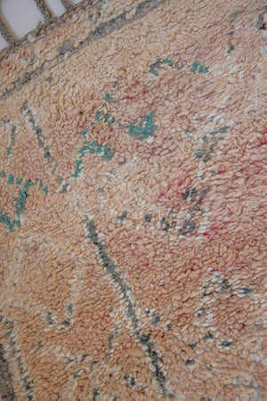 Bloom vintage Beni Ourain rug with a thick textured pile, peach coloured, grey tassels.