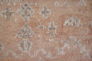 Bloom vintage Beni Ourain rug with a thick textured pile, peach coloured, grey tassels.