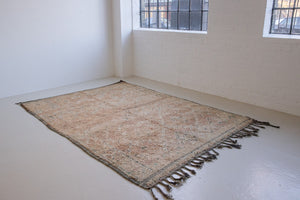 Bloom vintage Beni Ourain rug with a thick textured pile, peach coloured, grey tassels.