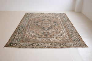A decorative Heriz rug. Featuring a classic Heriz design in gorgeous soft blue, taupe and cream tones.