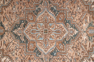 A decorative Heriz rug. Featuring a classic Heriz design in gorgeous soft blue, taupe and cream tones.