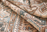 A decorative Heriz rug. Featuring a classic Heriz design in gorgeous soft blue, taupe and cream tones.