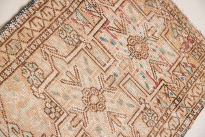 Bonnie is an vintage Persian Heriz runner rug which has been antique washed using a special technique to gently fade its original colours, creating a stunning muted palette. Heriz rugs are some of the most sought after Persian carpets and this one features a classic Heriz design in gorgeous soft blue, taupe and cream tones. 