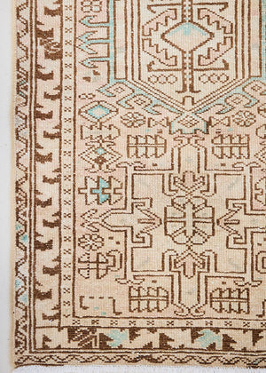 This is an vintage Persian Heriz runner which has been antique washed. Heriz carpets are some of the most sought after Persian designs and this rug features a classic Heriz design in gorgeous soft blue, taupe and cream tones. 