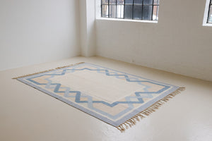 This is a vintage Swedish rug, colourful kilims often feature strong lines and designs inspired by floral and botanical motifs. 
