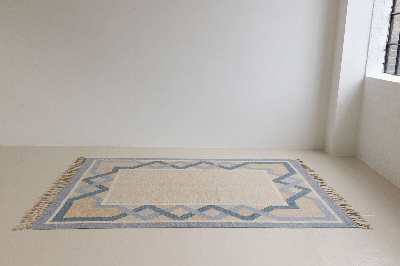 This is a vintage Swedish rug, colourful kilims often feature strong lines and designs inspired by floral and botanical motifs. 