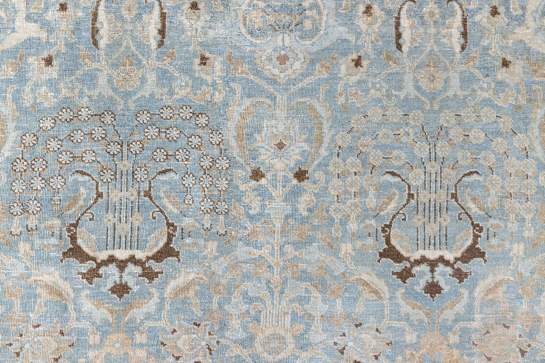 Iris is an antique Persian Tabriz rug with a lovely muted colour palette and an intricate all over design. Iris features a beautiful repeat Tree of Life pattern symbolising growth and eternity.