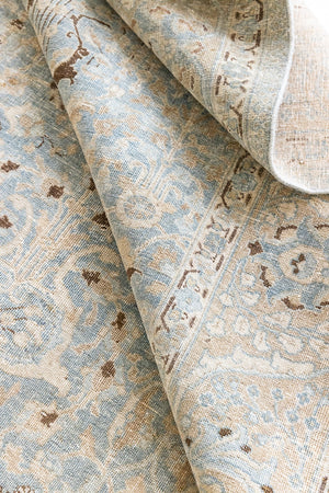 Iris is an antique Persian Tabriz rug with a lovely muted colour palette and an intricate all over design. Iris features a beautiful repeat Tree of Life pattern symbolising growth and eternity.