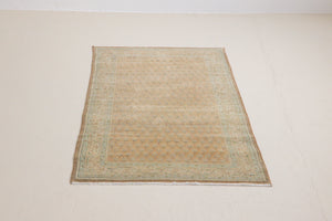 Jemima is a vintage rug handwoven in Turkey approximately 80 years ago. This rug features the classic boteh or paisley design and a refined, soft colour palette.