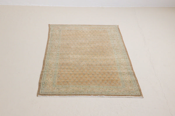 Jemima is a vintage rug handwoven in Turkey approximately 80 years ago. This rug features the classic boteh or paisley design and a refined, soft colour palette.