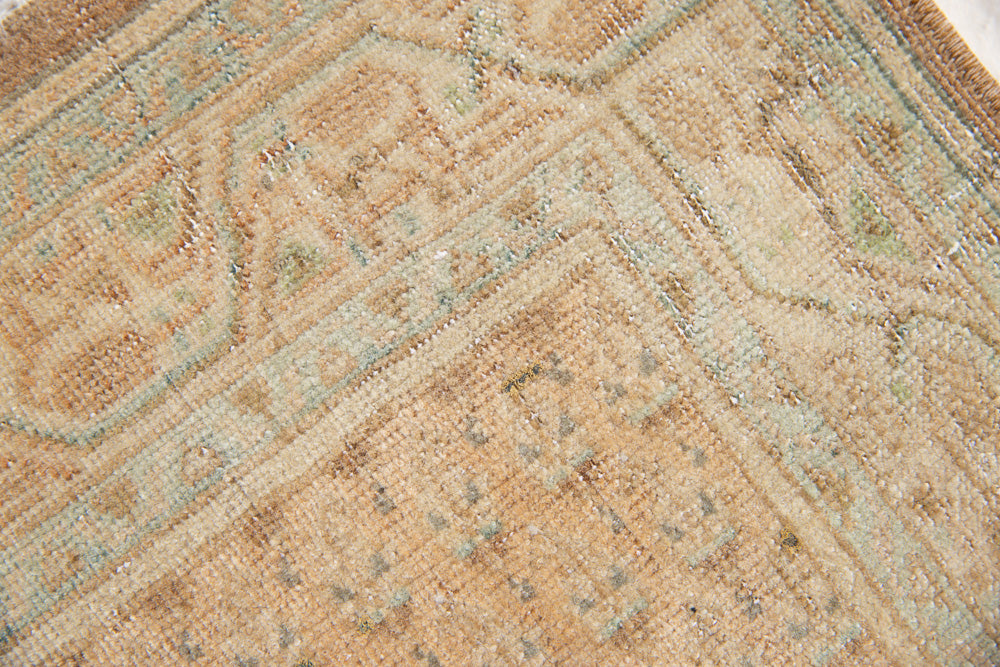 Jemima is a vintage rug handwoven in Turkey approximately 80 years ago. This rug features the classic boteh or paisley design and a refined, soft colour palette.