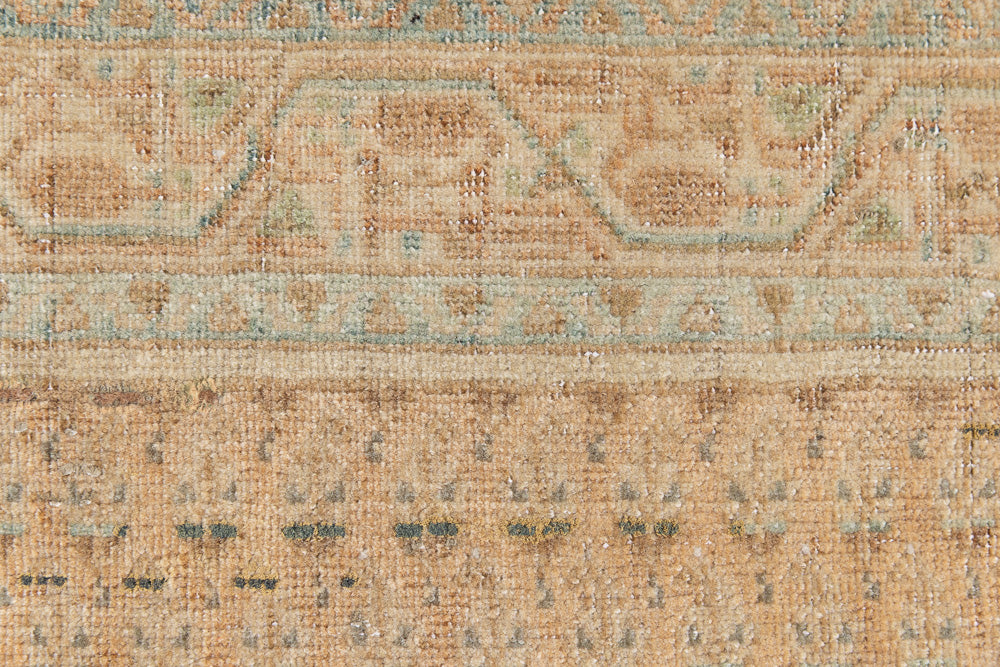 Jemima is a vintage rug handwoven in Turkey approximately 80 years ago. This rug features the classic boteh or paisley design and a refined, soft colour palette.