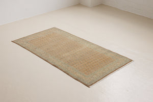 Jemima is a vintage rug handwoven in Turkey approximately 80 years ago. This rug features the classic boteh or paisley design and a refined, soft colour palette.