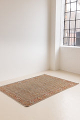 Tabriz rugs are celebrated for their incredible precision, calm symmetry and intricate designs. This piece features a stunning all over Herati pattern and an incredible palette of soft terracotta and sky blue.