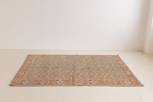 Tabriz rugs are celebrated for their incredible precision, calm symmetry and intricate designs. This piece features a stunning all over Herati pattern and an incredible palette of soft terracotta and sky blue.
