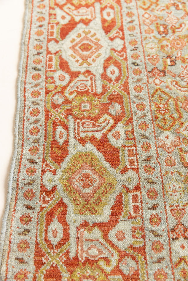 Tabriz rugs are celebrated for their incredible precision, calm symmetry and intricate designs. This piece features a stunning all over Herati pattern and an incredible palette of soft terracotta and sky blue.