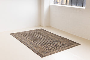 Liberty is a handmade Malayer rug, woven in the North West of Persia. This vintage carpet features a beautifully intricate repeating design and a rare colour palette.