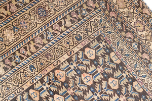 Liberty is a handmade Malayer rug, woven in the North West of Persia. This vintage carpet features a beautifully intricate repeating design and a rare colour palette.