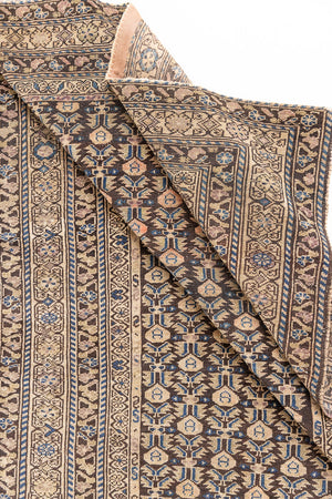 Liberty is a handmade Malayer rug, woven in the North West of Persia. This vintage carpet features a beautifully intricate repeating design and a rare colour palette.
