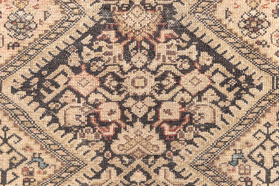 This a Vintage Persian Rug from Qashqai in Persia. This hand woven Carpet features a lovely pink and dark brown colour palette with a central medallion design.