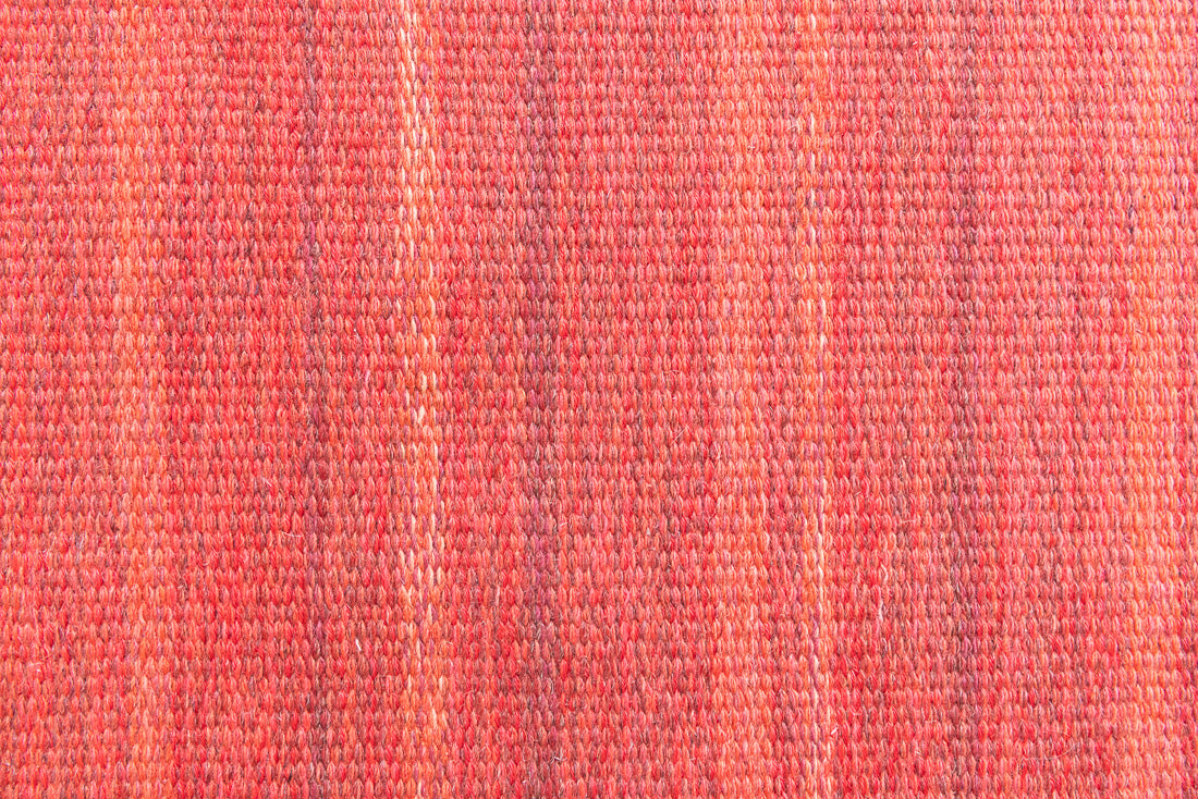 Tuva is a vintage rug handwoven in Sweden by the textile designer Ingegerd Silow. This piece features a rare red ground and sought after design.