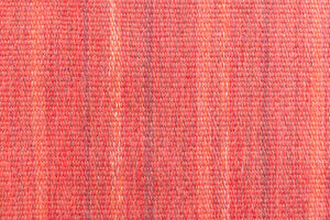 Tuva is a vintage rug handwoven in Sweden by the textile designer Ingegerd Silow. This piece features a rare red ground and sought after design.