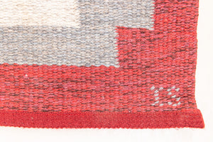 Tuva is a vintage rug handwoven in Sweden by the textile designer Ingegerd Silow. This piece features a rare red ground and sought after design.