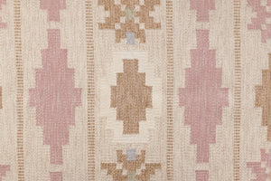 Trina is an original Swedish röllakan rug handwoven by the mid-century textile designer Anna Johanna Angström. This vintage rug features geometric designs in pink, blue, and brown on a beige ground.