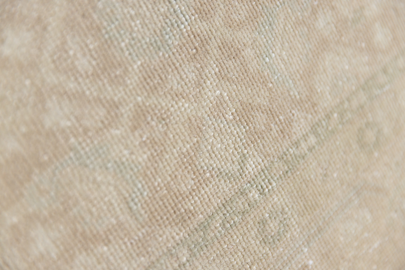 Misty is an antique Persian Tabriz rug which has been over-dyed using a special technique to gently fade its original colours, creating a stunning soft palette on this handwoven carpet from Persia.