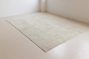 Misty is an antique Persian Tabriz rug which has been over-dyed using a special technique to gently fade its original colours, creating a stunning soft palette on this handwoven carpet from Persia.