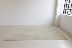 Misty is an antique Persian Tabriz rug which has been over-dyed using a special technique to gently fade its original colours, creating a stunning soft palette on this handwoven carpet from Persia.