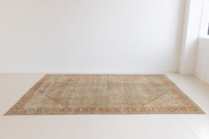 This is a Persian Mahal rug with a beautiful palette of reds oranges blues and a wonderful patina with lovely natural wear. Mahal in Persia produces the finest of carpets and this is one of them.