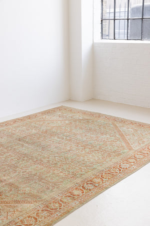 This is a Persian Mahal rug with a beautiful palette of reds oranges blues and a wonderful patina with lovely natural wear. Mahal in Persia produces the finest of carpets and this is one of them.