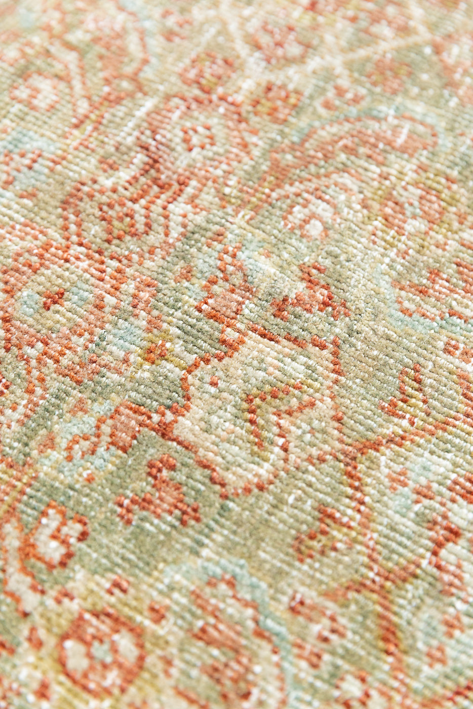 This is a Persian Mahal rug with a beautiful palette of reds oranges blues and a wonderful patina with lovely natural wear. Mahal in Persia produces the finest of carpets and this is one of them.