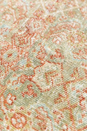 This is a Persian Mahal rug with a beautiful palette of reds oranges blues and a wonderful patina with lovely natural wear. Mahal in Persia produces the finest of carpets and this is one of them.