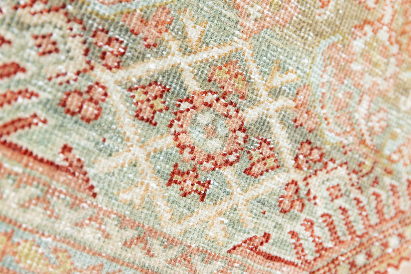 This is a Persian Mahal rug with a beautiful palette of reds oranges blues and a wonderful patina with lovely natural wear. Mahal in Persia produces the finest of carpets and this is one of them.
