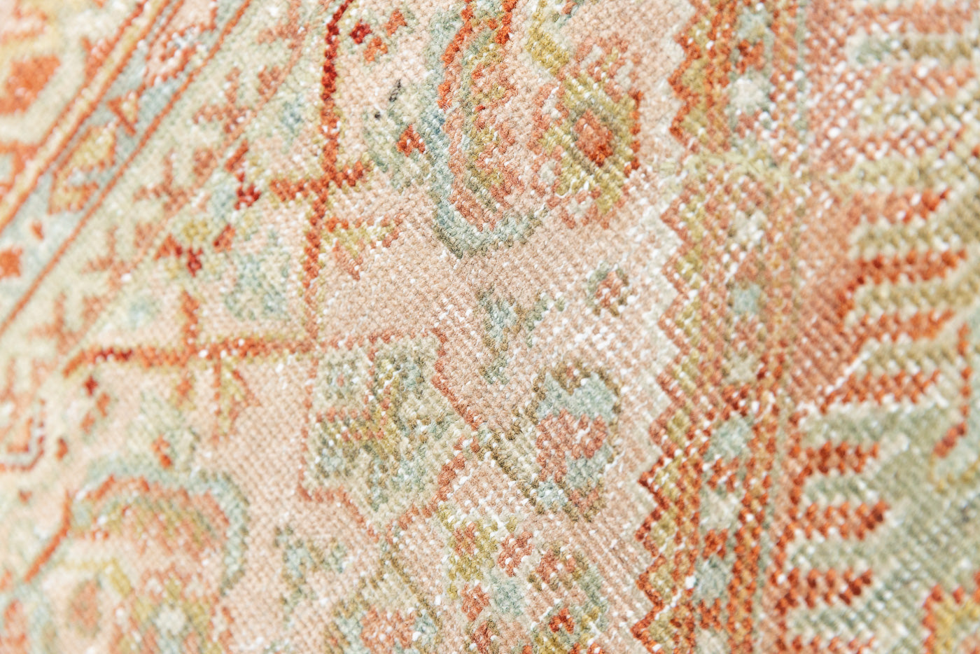 This is a Persian Mahal rug with a beautiful palette of reds oranges blues and a wonderful patina with lovely natural wear. Mahal in Persia produces the finest of carpets and this is one of them.