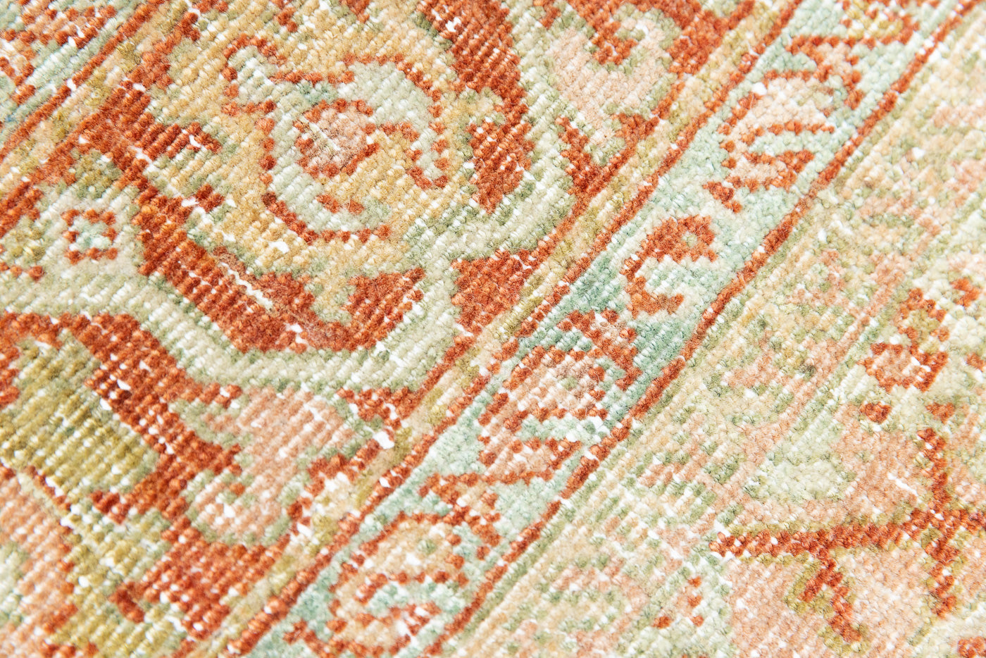 This is a Persian Mahal rug with a beautiful palette of reds oranges blues and a wonderful patina with lovely natural wear. Mahal in Persia produces the finest of carpets and this is one of them.