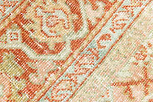 This is a Persian Mahal rug with a beautiful palette of reds oranges blues and a wonderful patina with lovely natural wear. Mahal in Persia produces the finest of carpets and this is one of them.