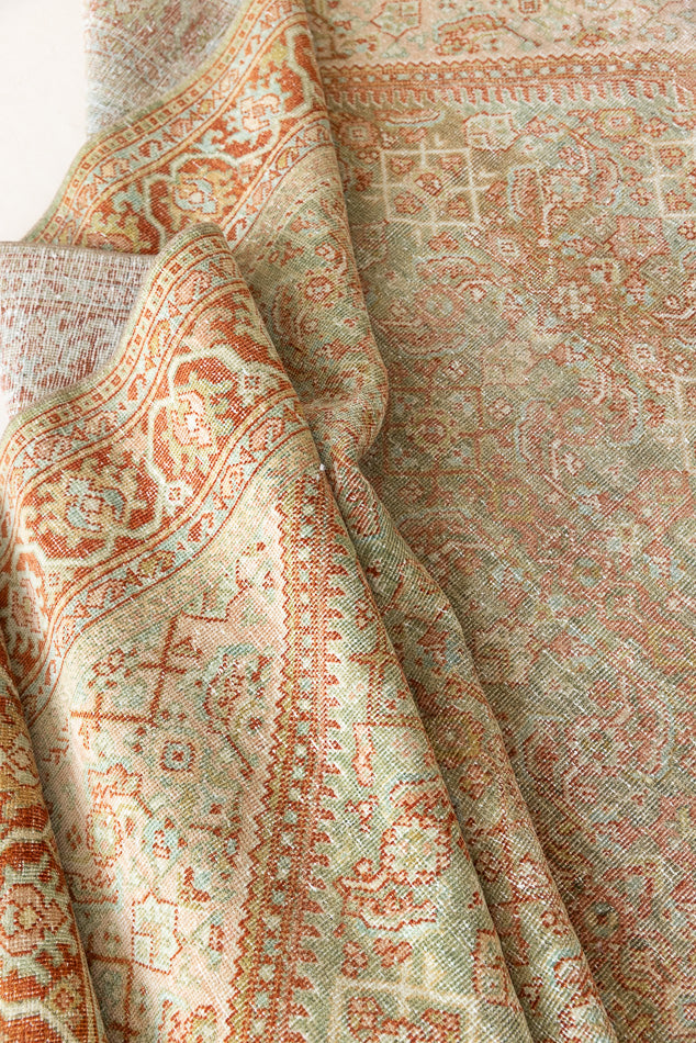 This is a Persian Mahal rug with a beautiful palette of reds oranges blues and a wonderful patina with lovely natural wear. Mahal in Persia produces the finest of carpets and this is one of them.