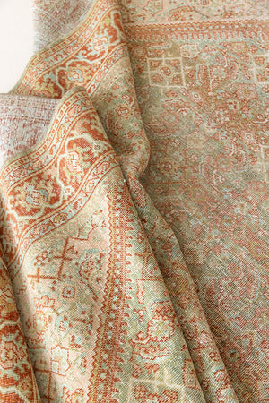 This is a Persian Mahal rug with a beautiful palette of reds oranges blues and a wonderful patina with lovely natural wear. Mahal in Persia produces the finest of carpets and this is one of them.