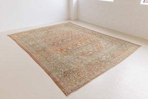 This is a Persian Mahal rug with a beautiful palette of reds oranges blues and a wonderful patina with lovely natural wear. Mahal in Persia produces the finest of carpets and this is one of them.