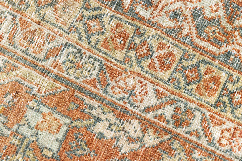 This is a Persian Mahal rug with a beautiful palette of reds oranges blues and a wonderful patina with lovely natural wear. Mahal in Persia produces the finest of carpets and this is one of them.
