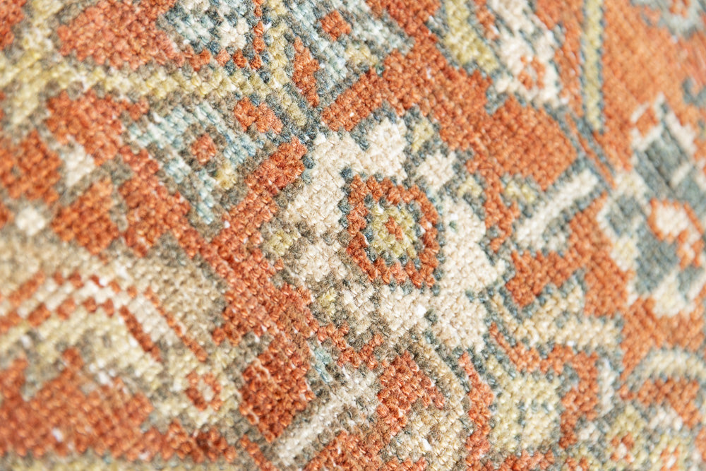 This is a Persian Mahal rug with a beautiful palette of reds oranges blues and a wonderful patina with lovely natural wear. Mahal in Persia produces the finest of carpets and this is one of them.
