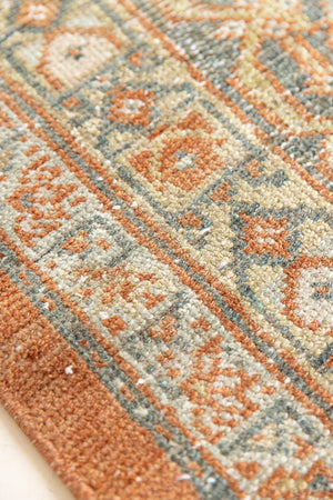This is a Persian Mahal rug with a beautiful palette of reds oranges blues and a wonderful patina with lovely natural wear. Mahal in Persia produces the finest of carpets and this is one of them.