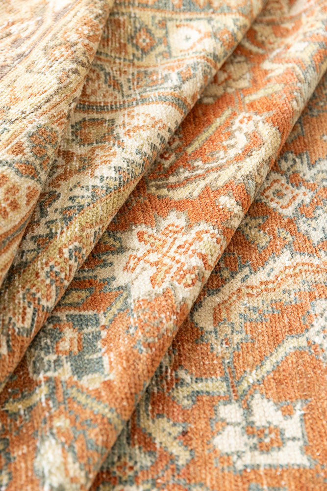 This is a Persian Mahal rug with a beautiful palette of reds oranges blues and a wonderful patina with lovely natural wear. Mahal in Persia produces the finest of carpets and this is one of them.