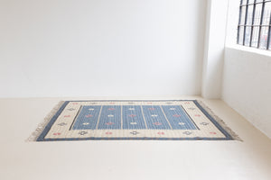 A Vintage Swedish Rug c1960. An original röllakan flatweave carpet featuring a unique design. 
