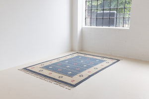 A Vintage Swedish Rug c1960. An original röllakan flatweave carpet featuring a unique design. 
